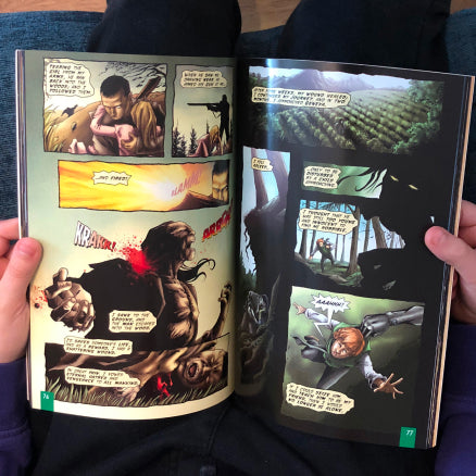 A young boy reads an open copy of Frankenstein The Graphic Novel, Quick Text, on his lap.